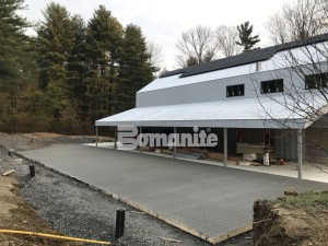 Residential Backyard Artist Studio Utilizes Grasscrete for Pervious Parking and Stormwater Managment installed by Premier Concrete Construction located in Massachusetts